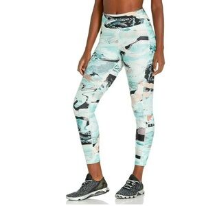Women’s Under Armour multi-color heat gear compression leggings Large
